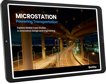 Tablet displaying a nighttime image of a highway and bridges with the text, "MICROSTATION Powering Transportation - Explore Global CAD Case Studies in Innovative Design and Engineering" on the screen. | Bentley Systems | Infrastructure Engineering Software Company Tablet displaying a nighttime image of a highway and bridges with the text, "MICROSTATION Powering Transportation - Explore Global CAD Case Studies in Innovative Design and Engineering" on the screen.