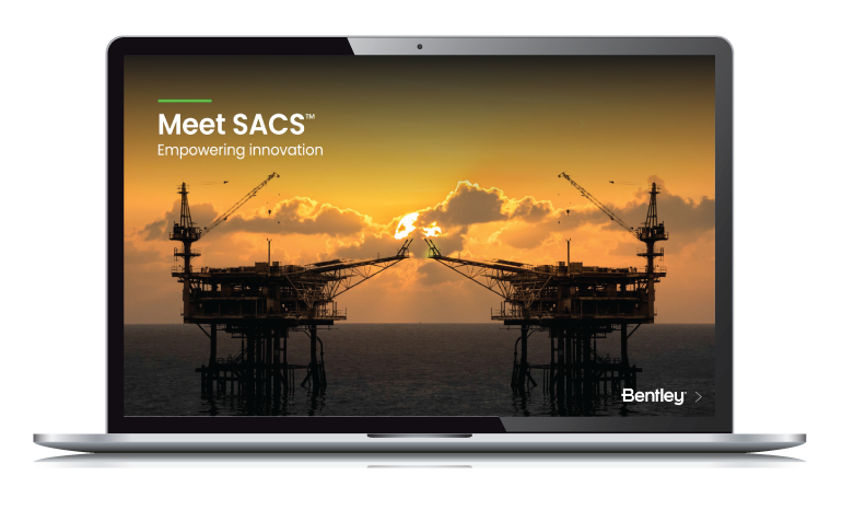 A laptop showcases an image of two offshore oil rigs at sunset, accompanied by the text "Meet SACS™ Empowering Innovation." This scene epitomizes the cutting-edge capabilities of Offshore Design and Analysis Software, seamlessly integrating precision with creativity.